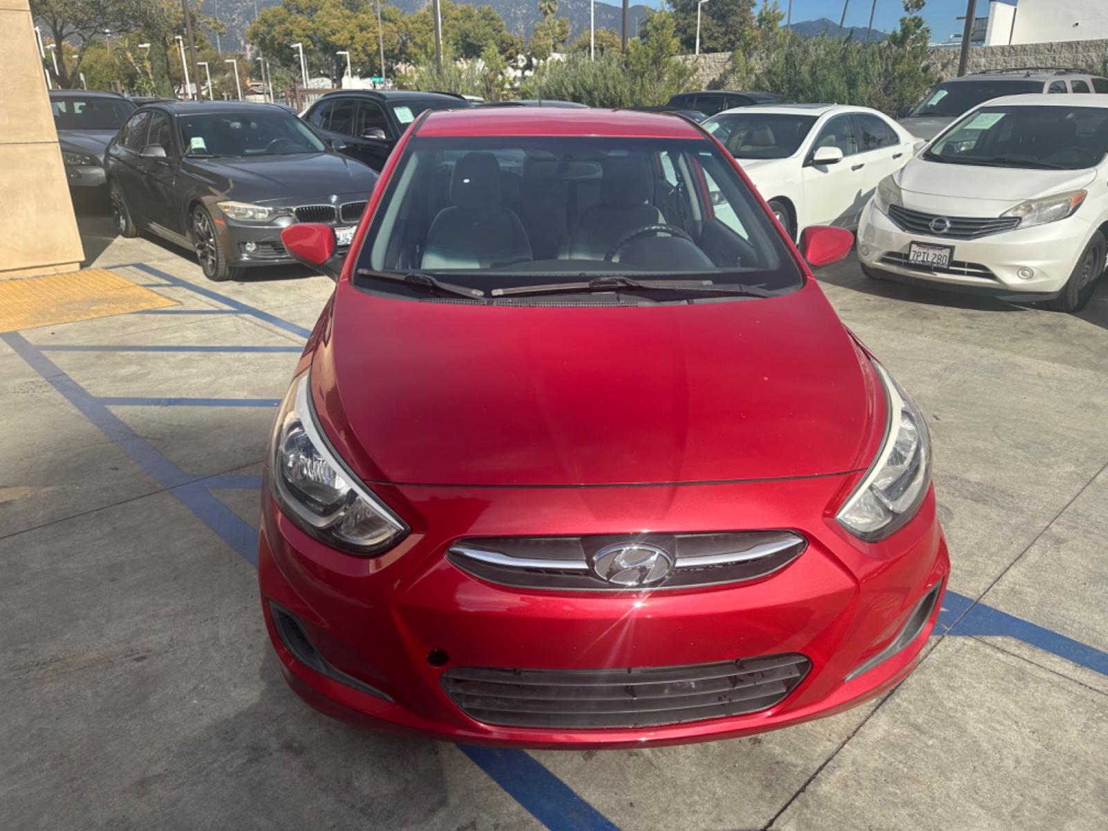 2015 Red /Gray Hyundai Accent GLS Sedan 4D (KMHCT4AE2FU) with an 4-Cyl, 1.6L engine, Auto, 6-Spd w/Overdrive transmission, located at 30 S. Berkeley Avenue, Pasadena, CA, 91107, (626) 248-7567, 34.145447, -118.109398 - The 2015 Hyundai Accent 4-Door Sedan stands as a testament to Hyundai's commitment to quality, efficiency, and value. Located in Pasadena, CA, our dealership specializes in providing a wide range of used BHPH (Buy Here Pay Here) cars, trucks, SUVs, and vans, including the remarkable Hyundai Accent. - Photo #22